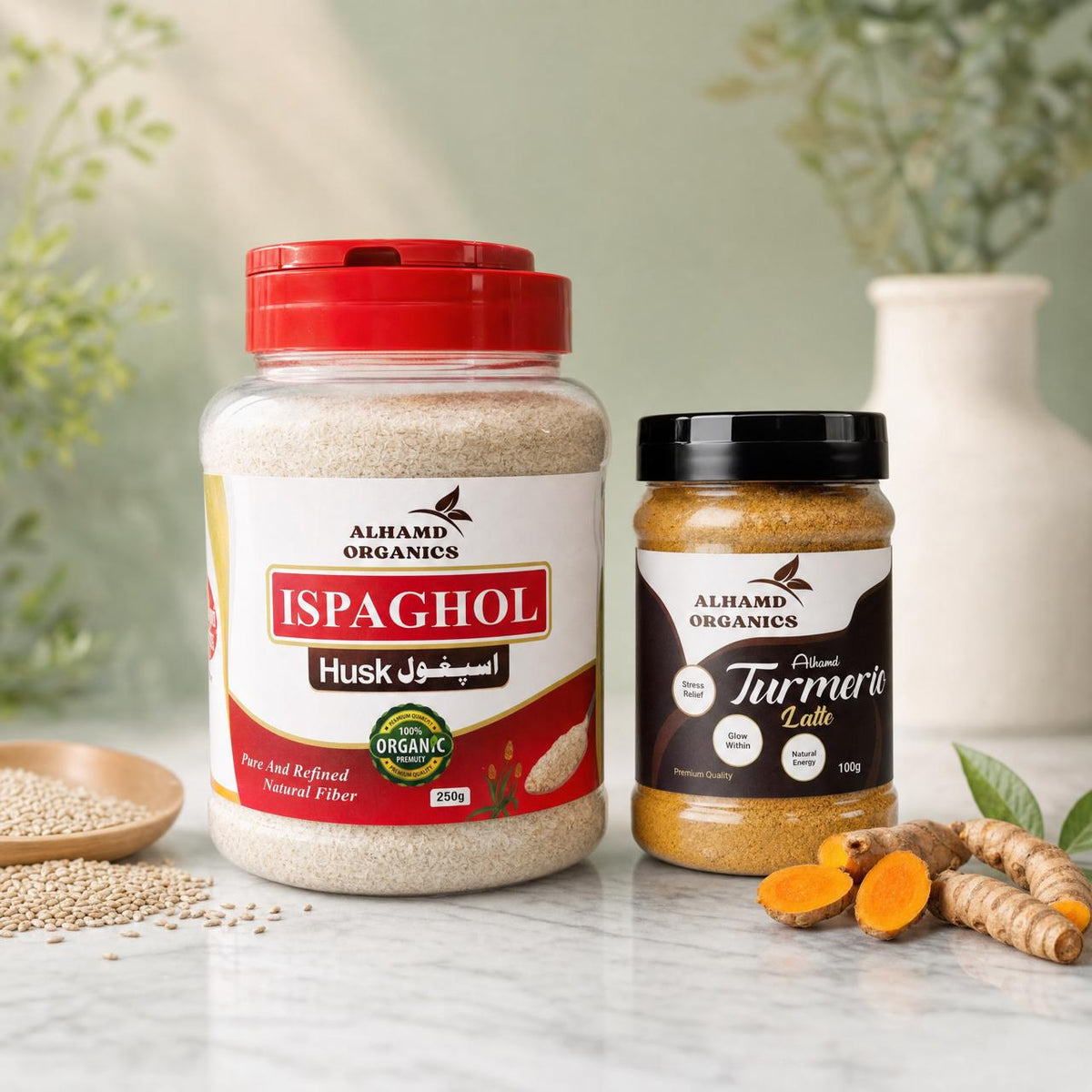Two jars of Alhamd Organics products on a marble surface with a blurred background