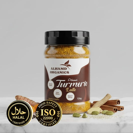 Jar of Alhamd Organics Turmeric Latte with spices on a white background