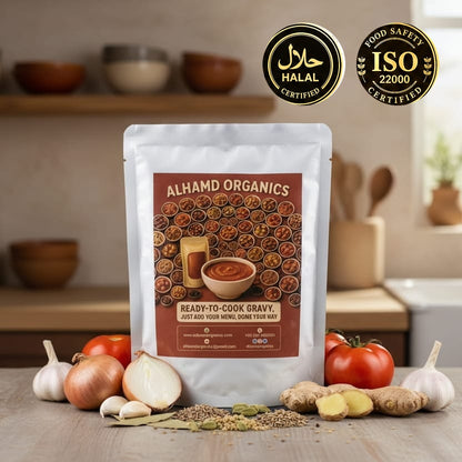 Alhamd Organics ready-to-cook gravy package on a kitchen counter with ingredients and certification logos.