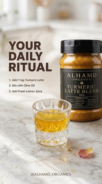 A jar of Alhamd Organics Turmeric Latte Blend next to a small glass of golden turmeric latte on a marble surface, with text reading 'YOUR DAILY RITUAL' and a list of daily steps.